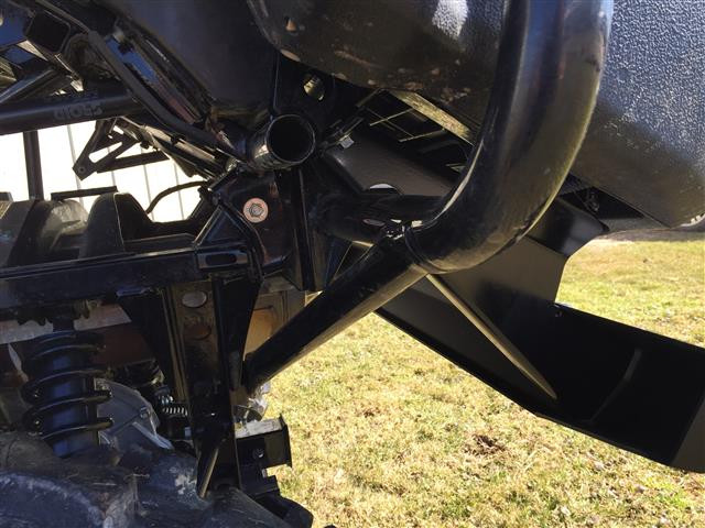 Underside close-up of the Extreme Metal Products rear bumper mounting bracket bolted to the Honda Pioneer 700 frame