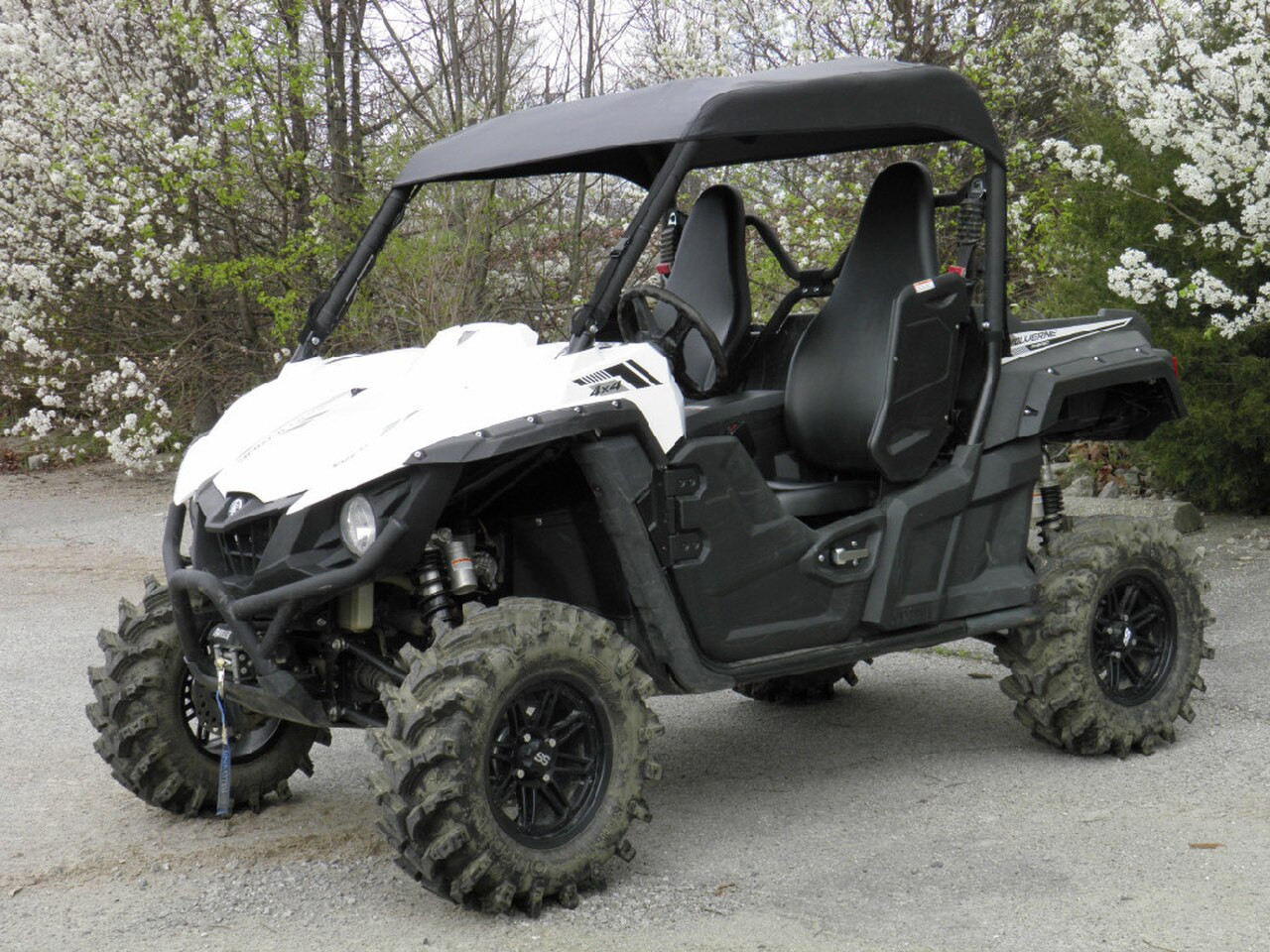 3 Star soft top on a white Yamaha Wolverine with mud tires, front three-quarter view