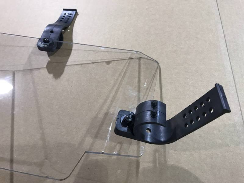 Close-up of the black tube clamp brackets on the corner of the Extreme Metal Products Maverick X3 rear window