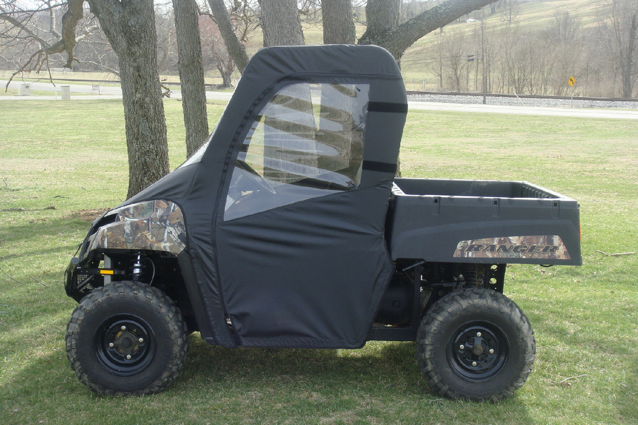 Side view of a Polaris Ranger 570 with the 3 Star full cab enclosure and vinyl windshield fully closed