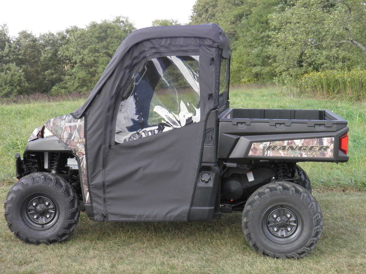 3 Star black soft door with clear window on a camo Polaris Ranger XP900, side view with full enclosure