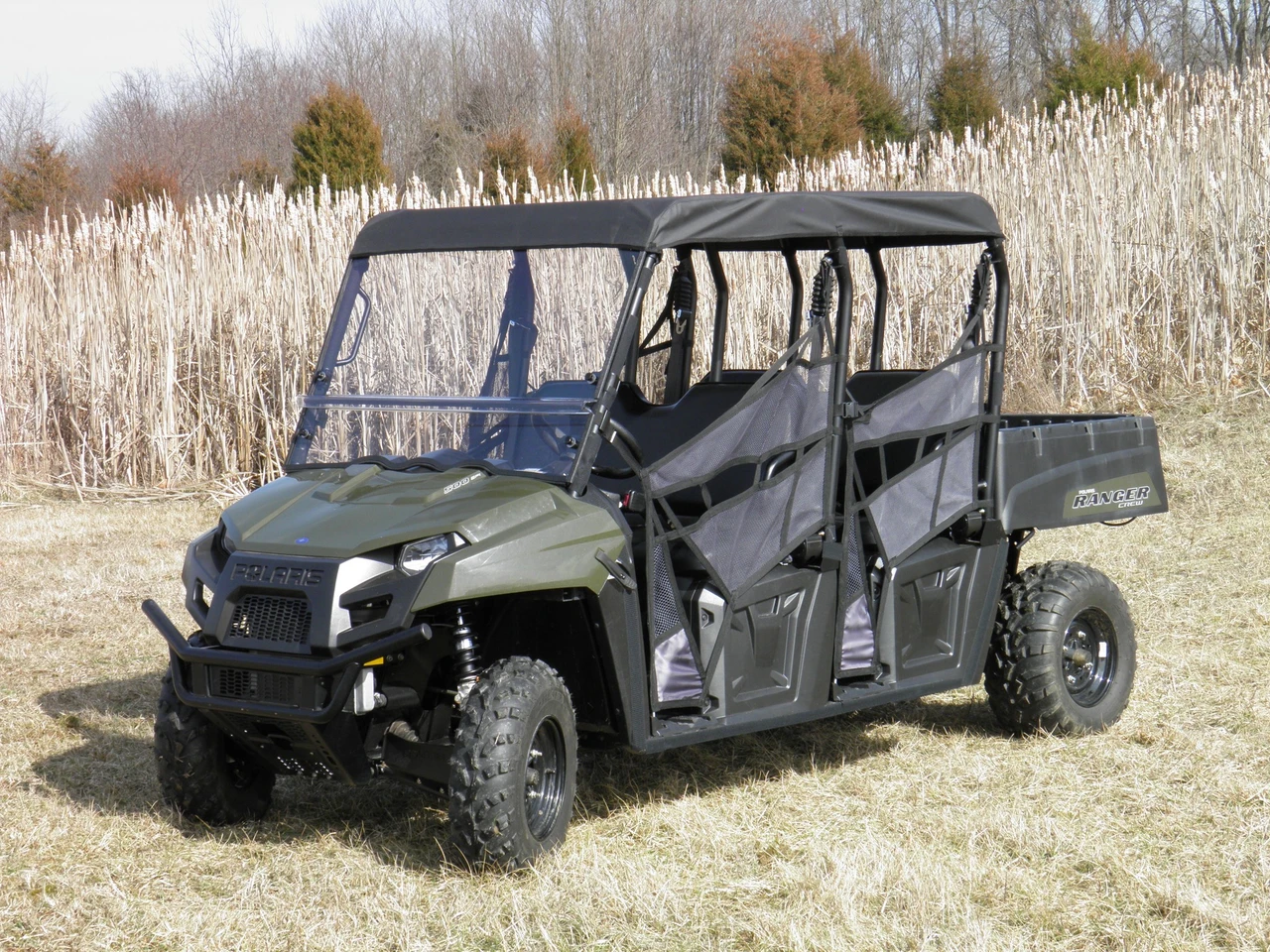 3 Star soft top installed on a green Polaris Ranger Mid-Size Crew, front three-quarter view in a field
