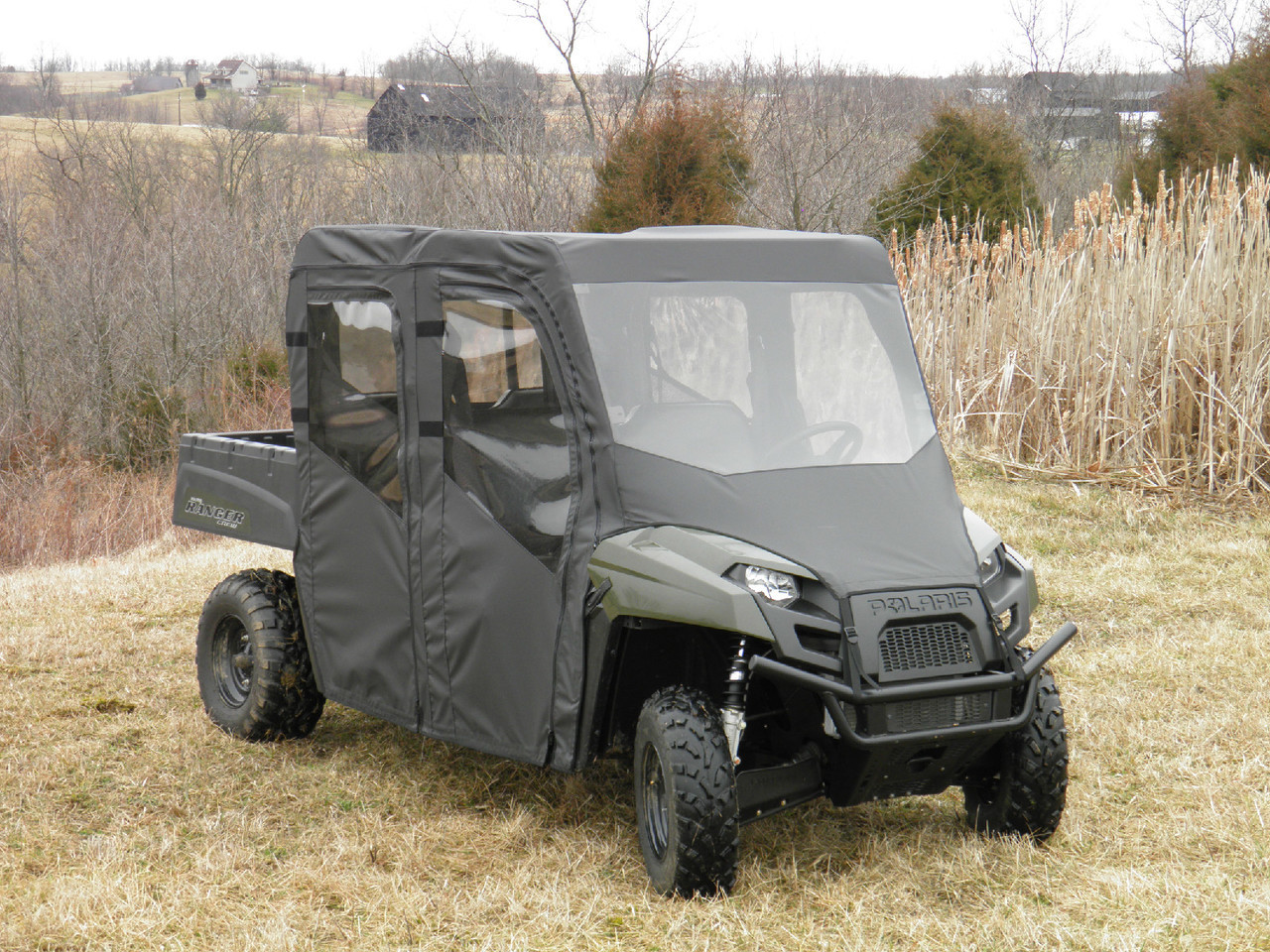 3 Star full cab enclosure with vinyl windshield on a Polaris Ranger 500/570 Crew, front three-quarter view
