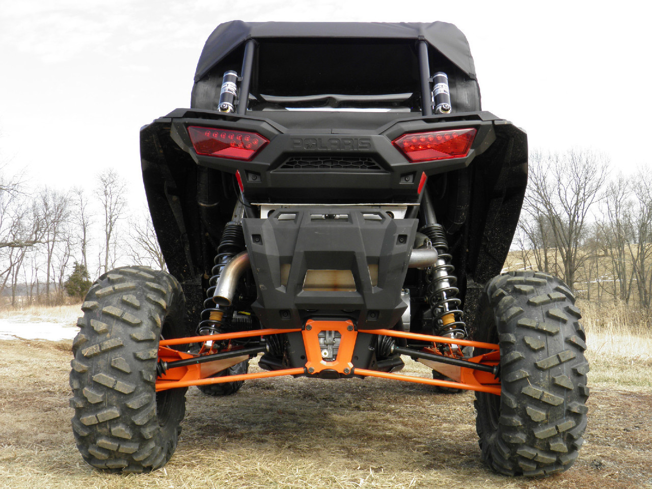 Rear view of a Polaris RZR XP1000 with the 3 Star soft rear window panel and top installed