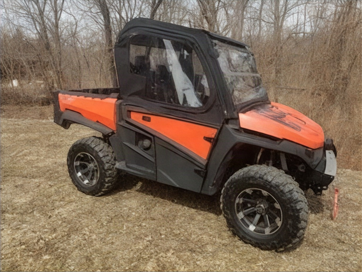 Side X Side upper doors kit installed on an orange Intimidator GC1K with full soft cab, front three-quarter view