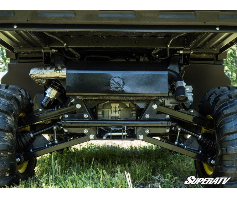 Underside view of the John Deere Gator XUV 835 rear suspension arms after the SuperATV 2 inch lift