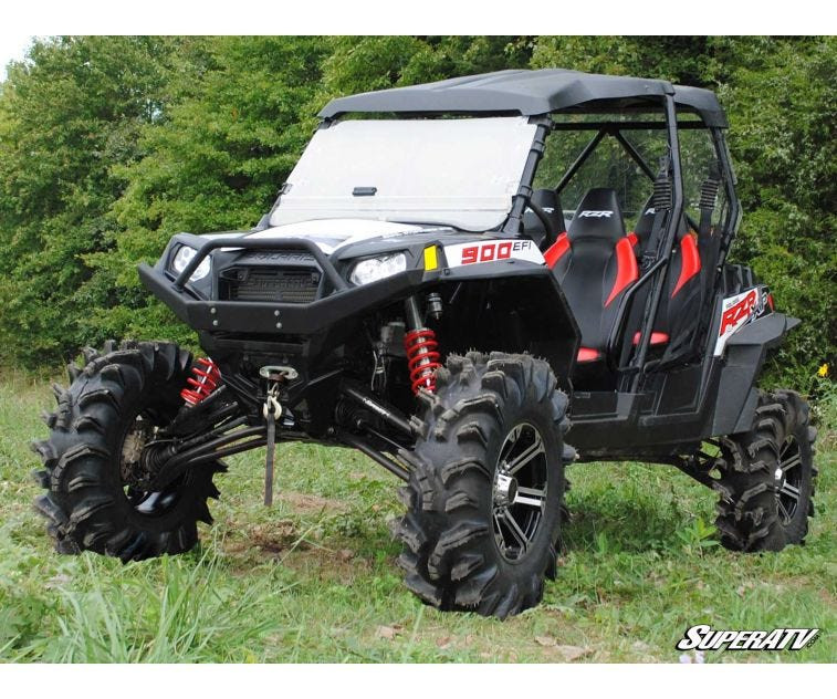 SuperATV 3-5 inch lift kit installed on a white and red Polaris RZR XP 900 with mud tires, front three-quarter view