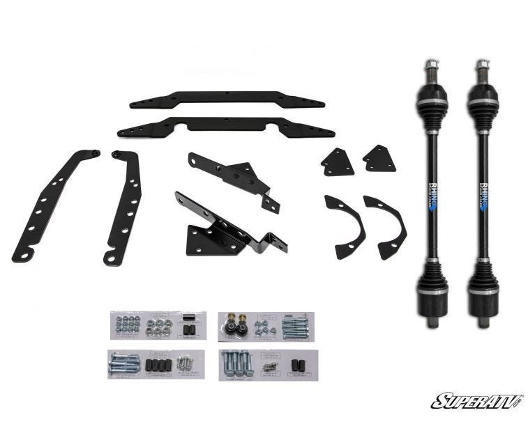 SuperATV Polaris RZR XP 900 lift kit components laid out, brackets, axles and hardware bags on white
