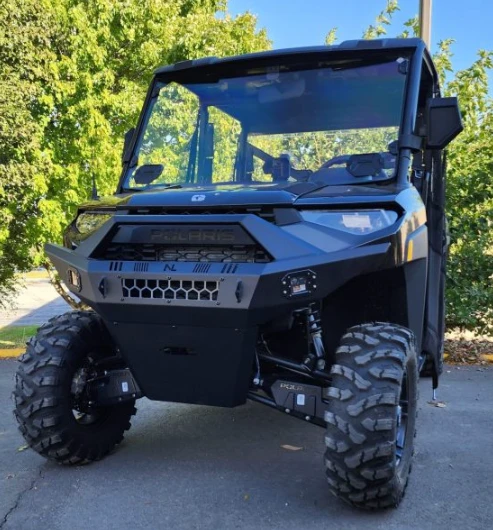No Limit Gen 2 front bumper installed on a black Polaris Ranger, front three-quarter view outdoors