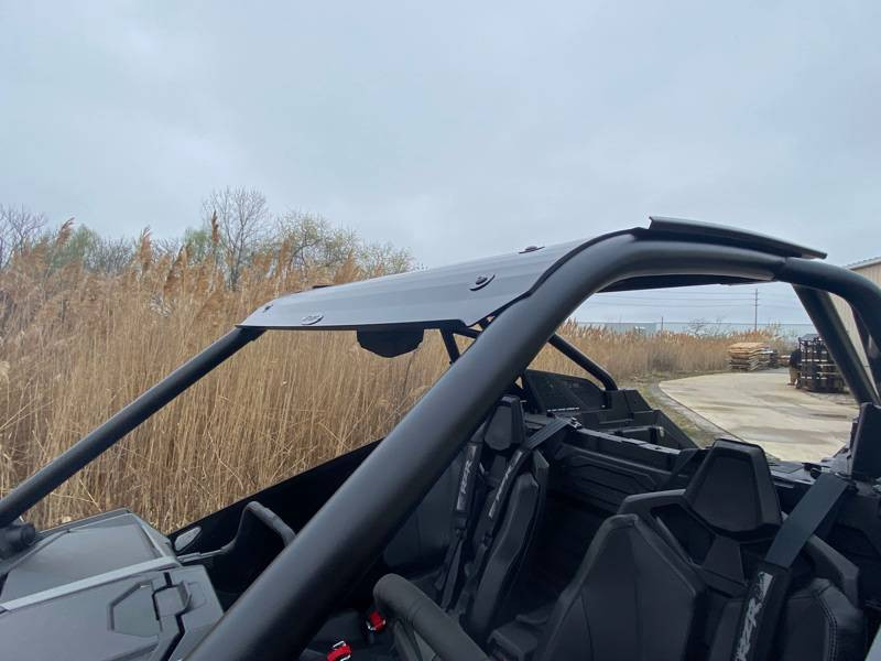 Passenger side view of the Extreme Metal Products black aluminum roof on a Polaris RZR Pro XP cage