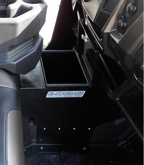 Hi-Standard center console in the Polaris Ranger with the lid open showing the storage compartment between the seats