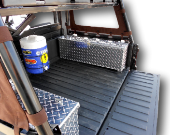 Hi-Standard diamond plate storage security box mounted in a Polaris Ranger cargo bed behind the cab