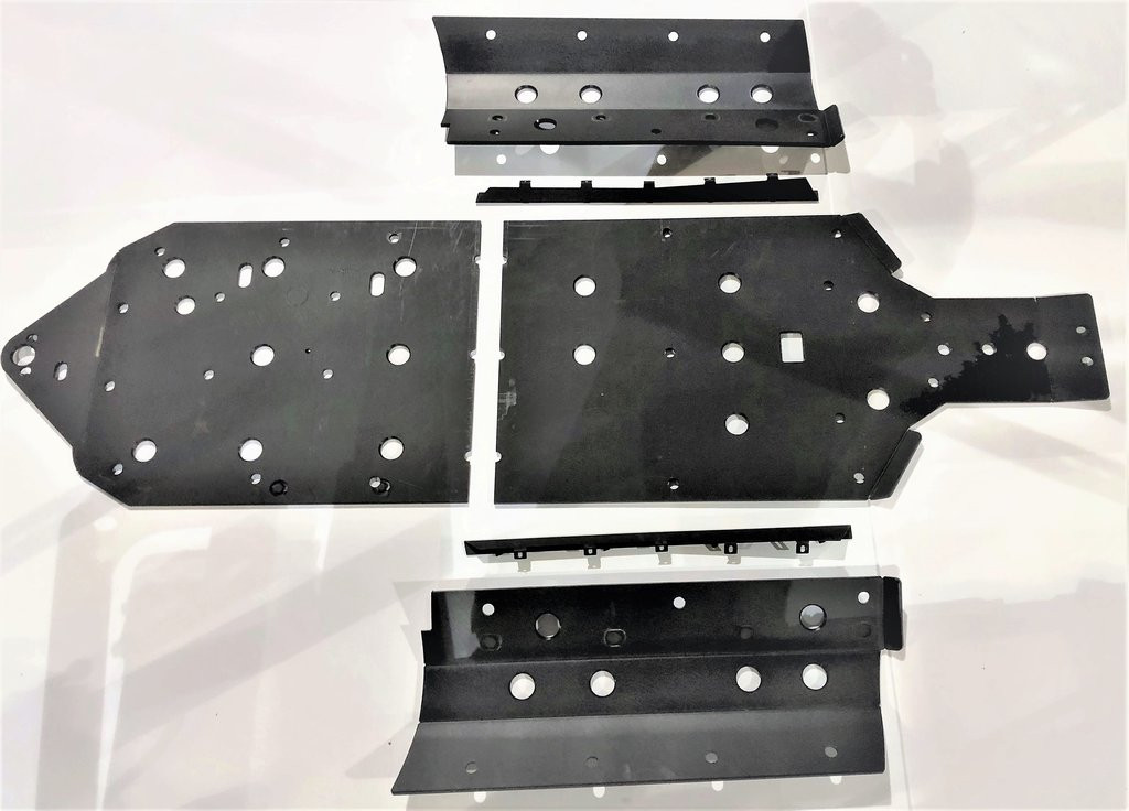 Trail Armor Honda Talon 1000 full skid plate kit laid out: main belly panel, side sections and rocker guards