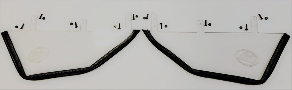 Pair of Trail Armor lower door inserts with rubber edge trim and hardware laid out on white, wide view
