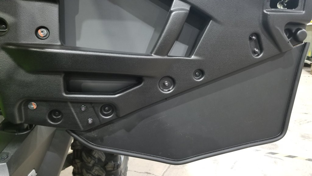 Close-up of the inside of the Trail Armor lower door insert with mounting hardware on the Talon door