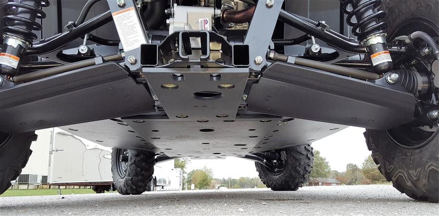 Underside front view of a Yamaha Wolverine with black Trail Armor A-arm and CV boot guards installed