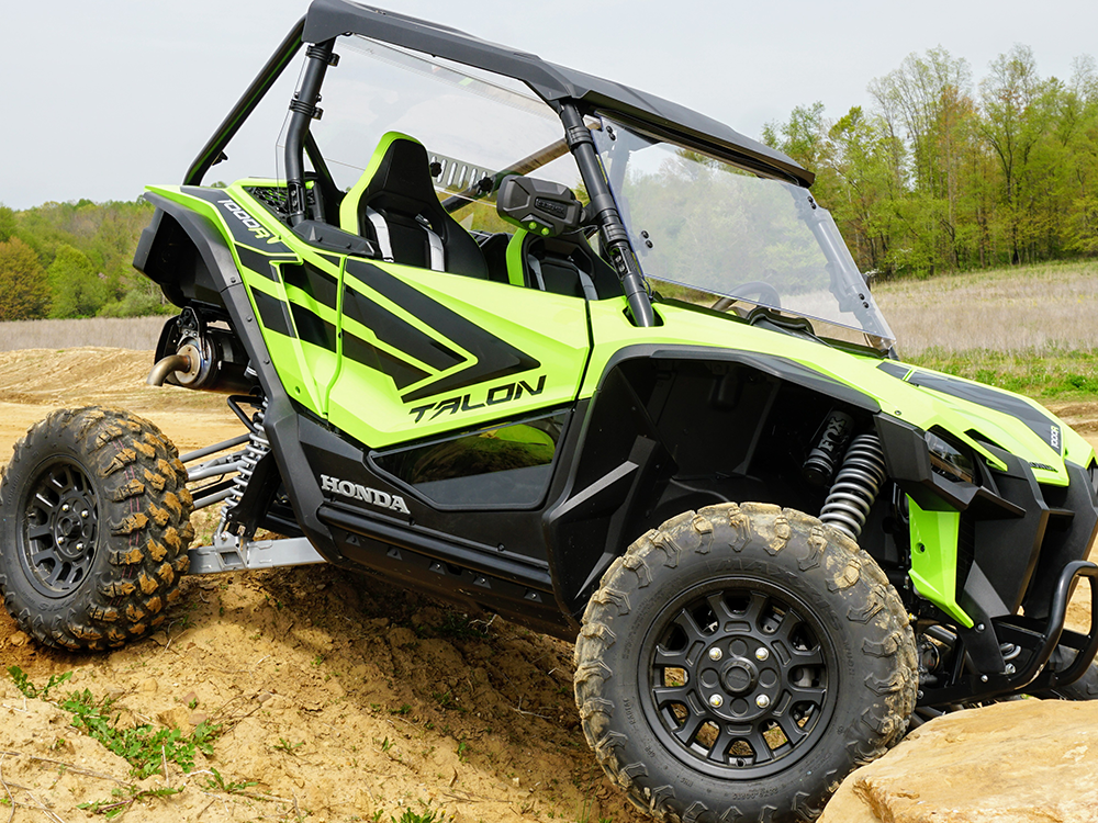 Spike door inserts for Honda Talon 2- and 4-seat: lower door inserts on a green Honda Talon, front corner view