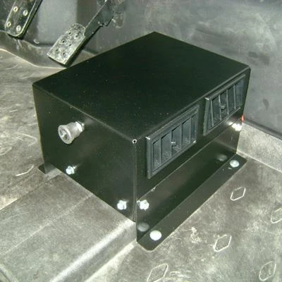 Universal Parts UTV cab heater unit bolted to the floor with mounting bracket and hose fitting visible