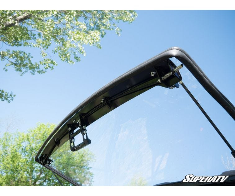 Close-up of the SuperATV flip windshield top hinge and latch on the Polaris Ranger 1000 cab frame