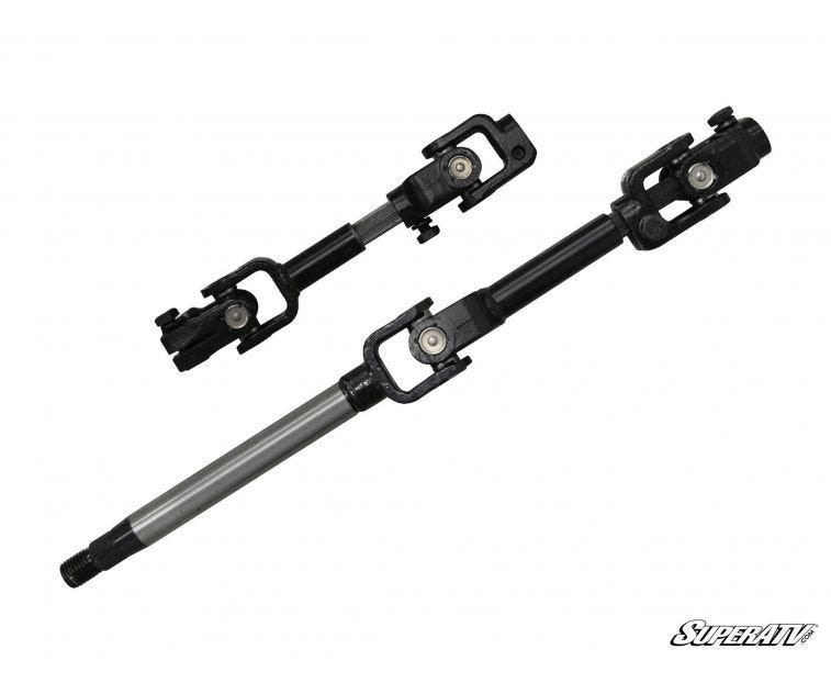 Two steering shafts with U-joints from the SuperATV power steering kit for a Polaris Ranger Midsize 570, on white