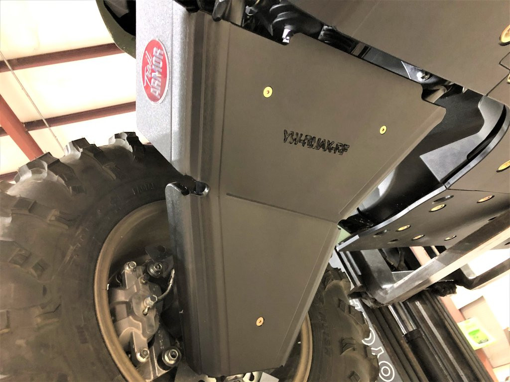 Trail Armor A-arm guard on the Yamaha Wolverine RMAX seen from beside the wheel showing the front edge