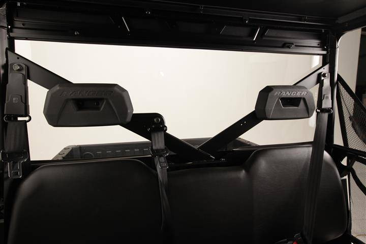 View from inside the cab through the Extreme Metal Products hard rear window, headrests and seat belts in front