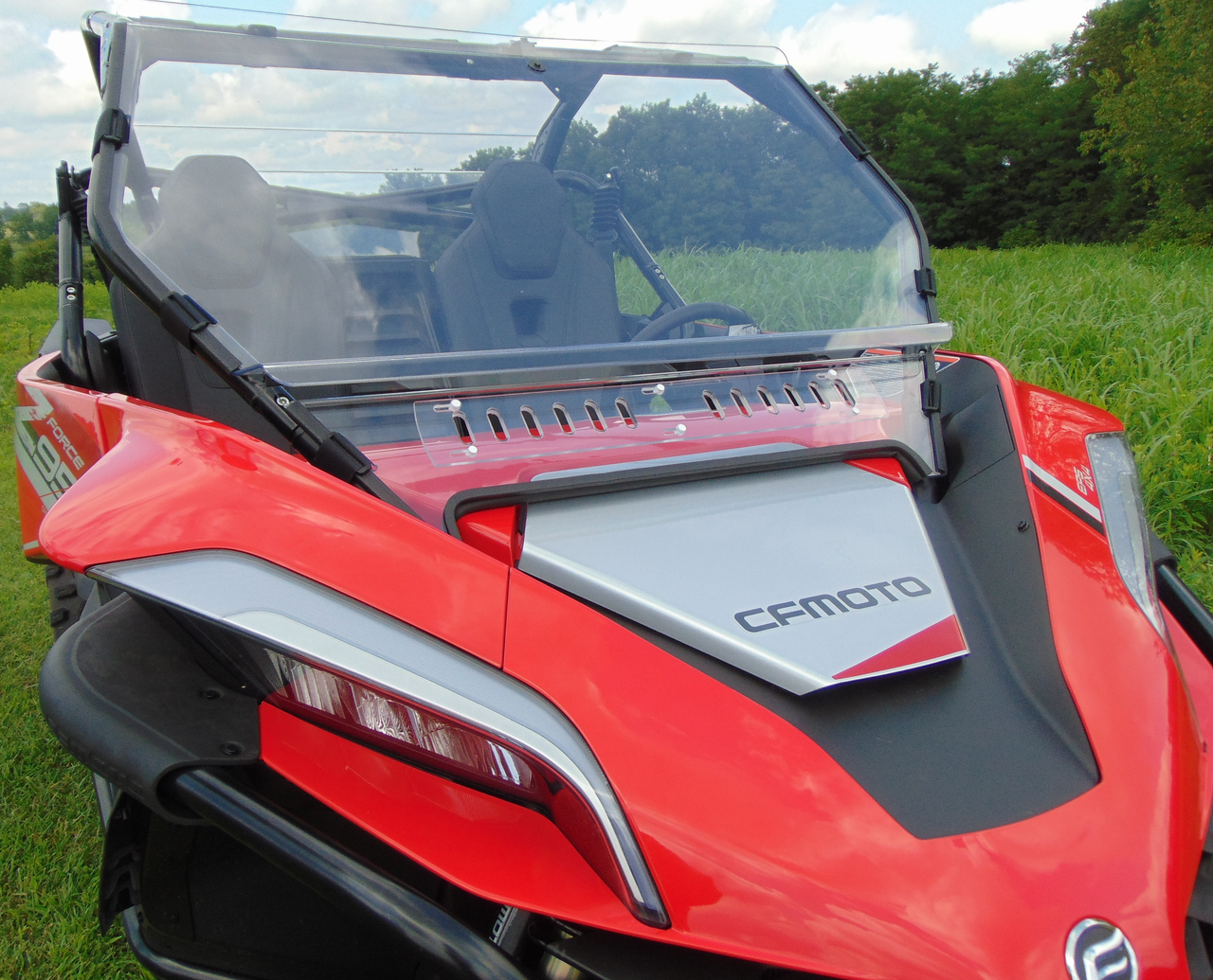 Passenger side front three-quarter view of the 3 Star 2-piece windshield on a red CF Moto ZForce 950