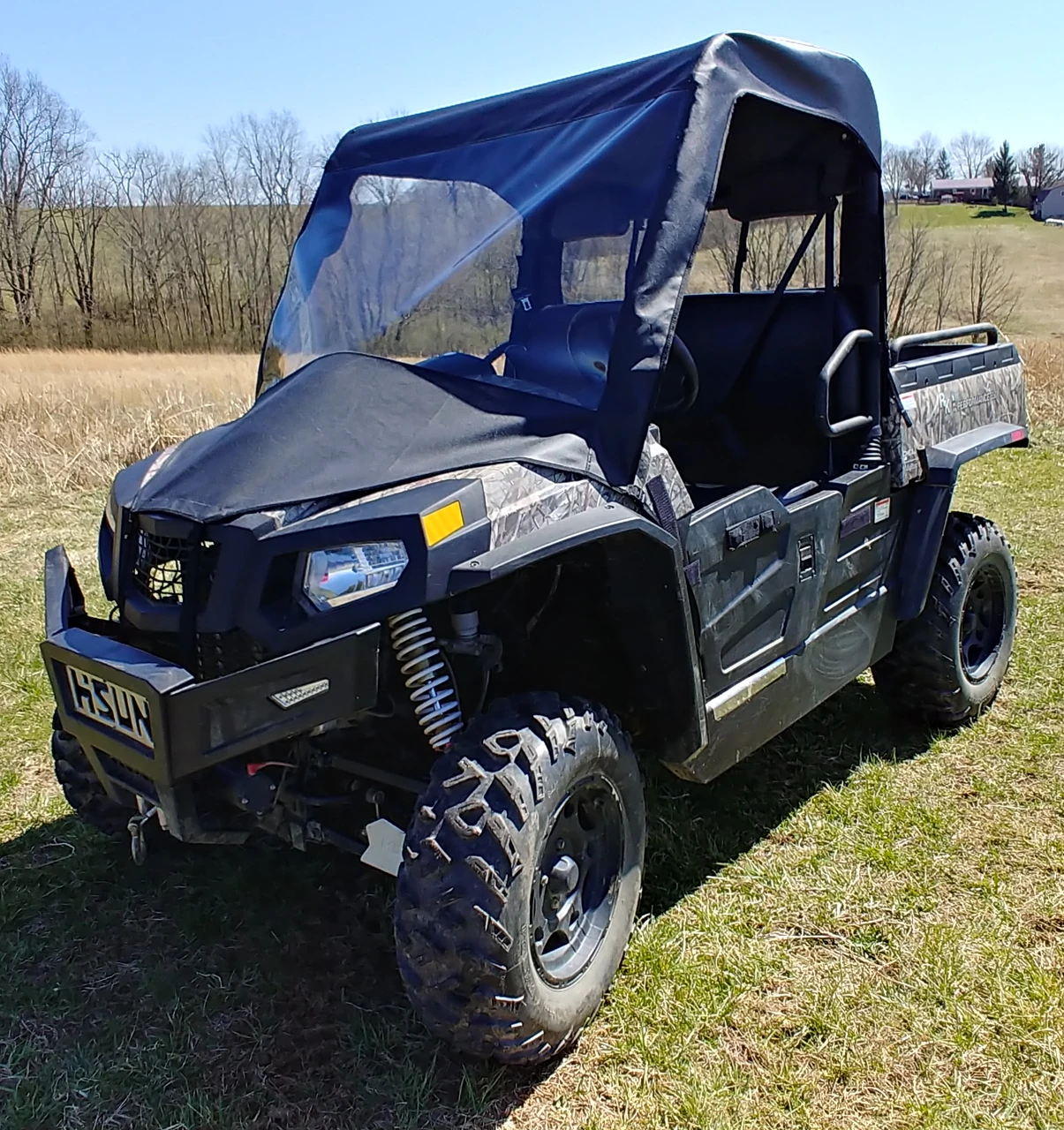 3 Star vinyl windshield, top and rear window combo installed on a camo Hisun Sector 550/750, front three-quarter view