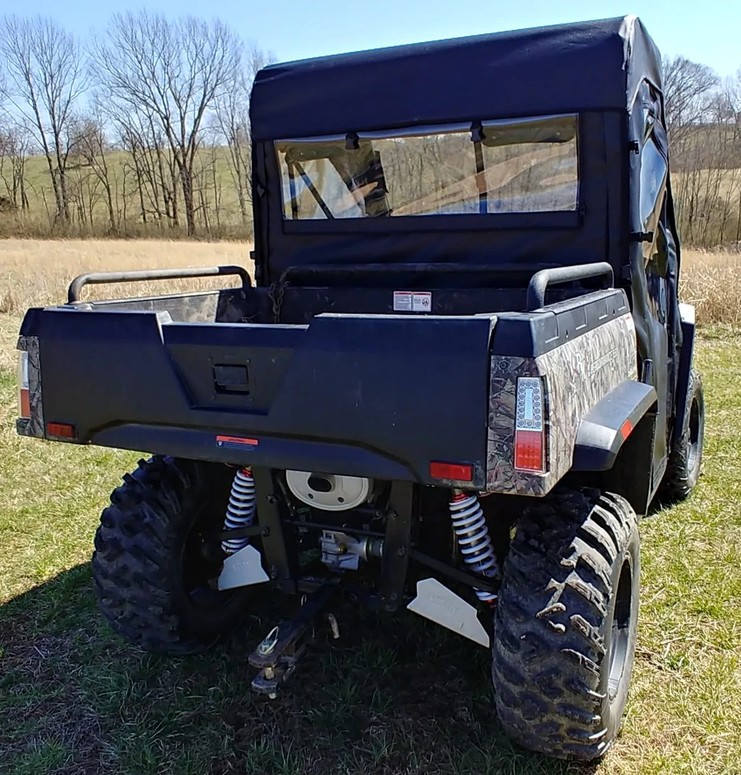 3 Star soft back panel with clear window installed behind the cab of a camo Hisun Sector 550/750, rear view