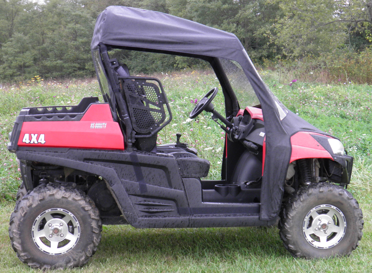 3 Star vinyl windshield, soft top and rear window combo on a red Hisun 800, driver side view in a field
