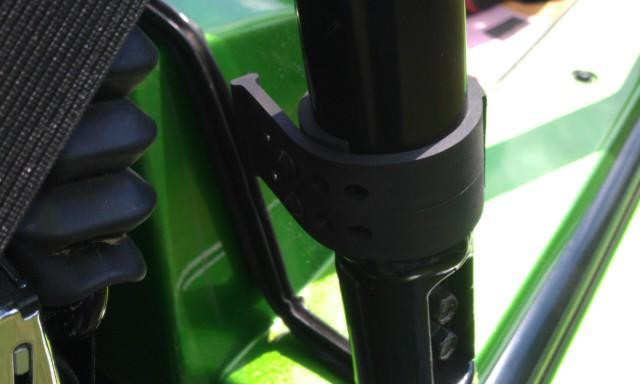 Close-up of the tube clamp securing the Extreme Metal Products rear window to the Wildcat roll cage