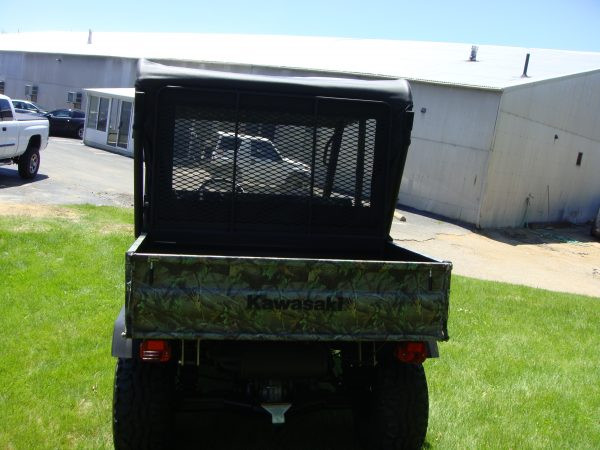 3 Star vinyl top and rear window on a camo Kawasaki Mule 3010 seen from behind through the mesh cab screen