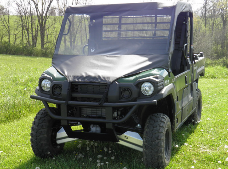 3 Star vinyl windshield, soft top and rear window combo on a green Kawasaki Mule ProFX, front view in a field