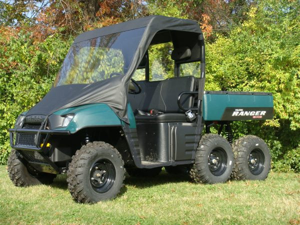 Front three-quarter view of a dark green Polaris Ranger 500/700 with the 3 Star vinyl windshield and top combo installed