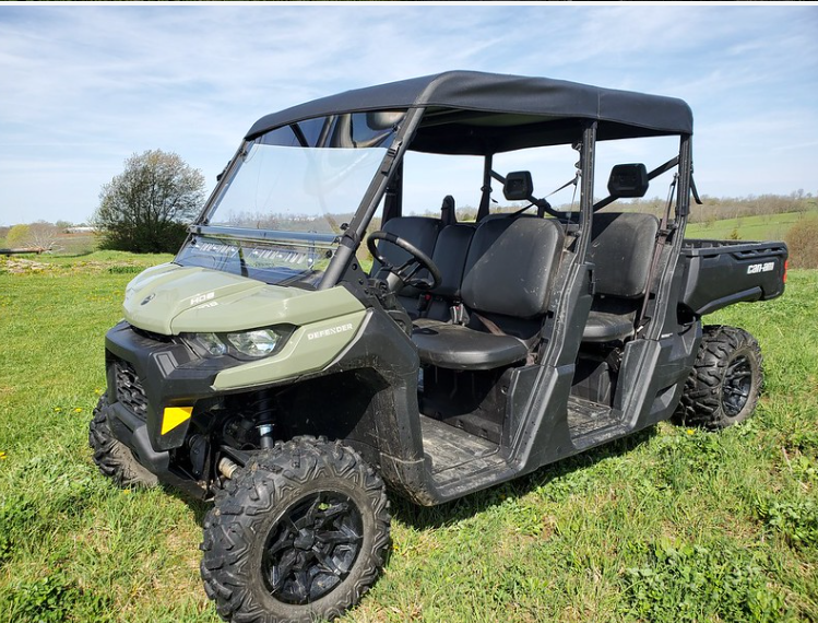 3 Star black soft top installed on a green Can-Am Defender Max, front three-quarter view in a field