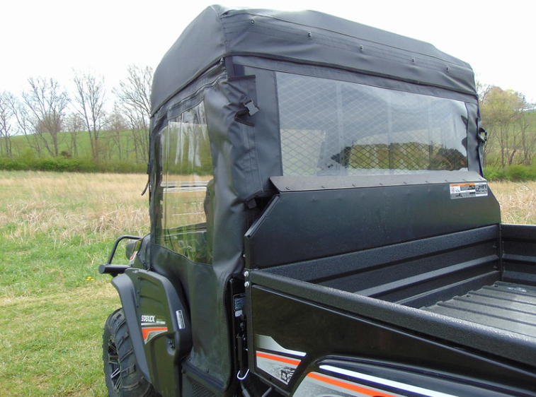 Close-up of the 3 Star soft rear window panel and door window above the cargo bed of a Kubota RTV XG850