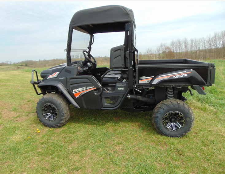 Side profile of a black Kubota RTV XG850 with the 3 Star soft top, windshield and doors installed in a field