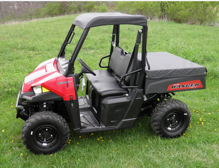 Driver side profile of a red Polaris Ranger 570 MidSize with the 3 Star black soft top installed