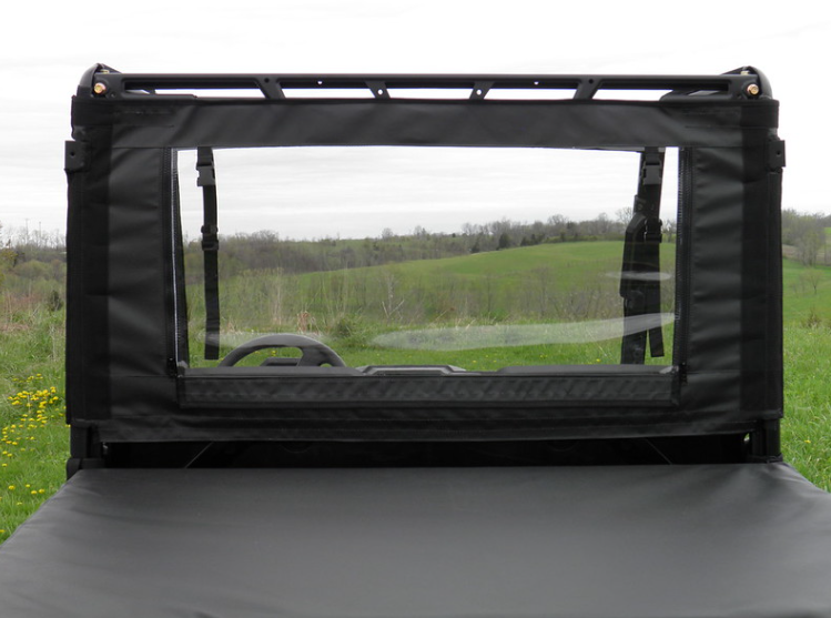 3 Star soft back panel with clear window installed behind the cab of a Polaris Ranger 570 MidSize, seen from the bed