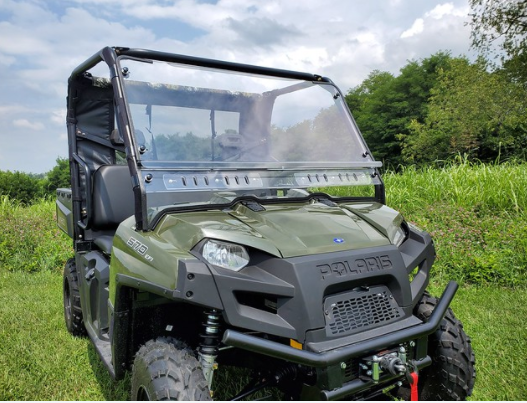 Front three-quarter view of a green Polaris Ranger 570 FullSize with the 3 Star 2-piece windshield installed