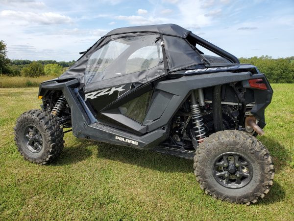 Driver side profile of the 3 Star cab enclosure on the Polaris RZR Pro XP showing the full door with clear window