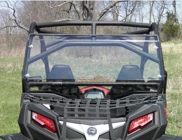 Straight rear view of the red CFMoto ZForce with the 3 Star Lexan rear window above the tail lights and cargo net