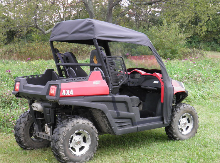 Rear three-quarter view of a red Hisun 800 with the 3 Star vinyl top installed, open rear