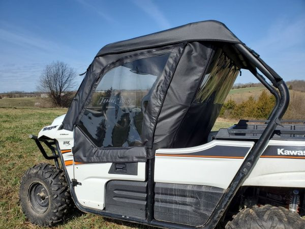 3 Star soft doors and rear window installed on a white Kawasaki Teryx 800, rear three-quarter view in a field