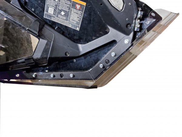 Inside view of a 3 Star lower door insert bolted to the bottom of a Polaris RZR door, hardware along the edge