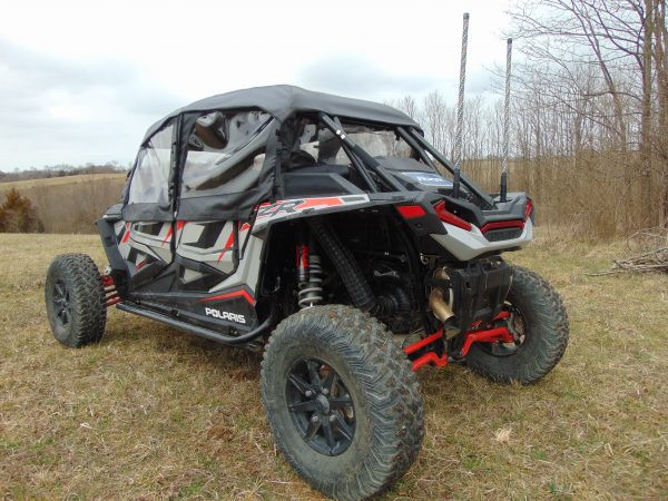 Rear three-quarter view of the Polaris RZR XP 1000-4 showing the 3 Star enclosure rear window and doors