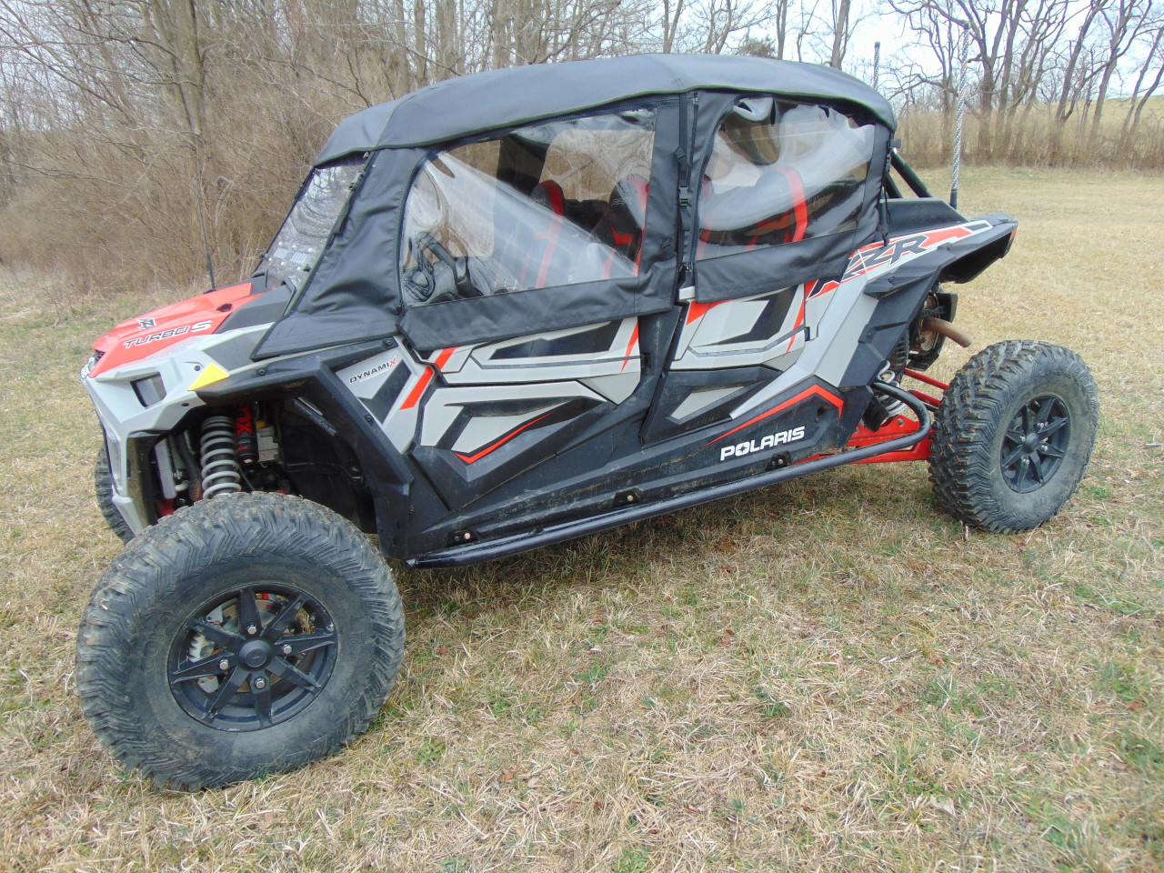 3 Star soft doors and rear window combo on a four-seat Polaris RZR XP1000-4, driver side view with soft top