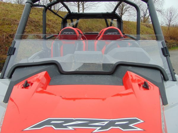 3 Star half windshield installed on a red and white Polaris RZR XP Turbo S, straight-on view over the hood