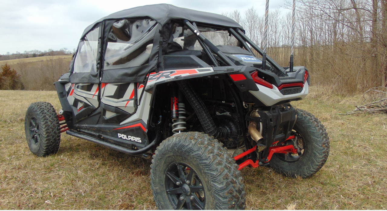 Rear three-quarter view of a Polaris RZR XP 4 Turbo S showing the 3 Star rear window and soft doors