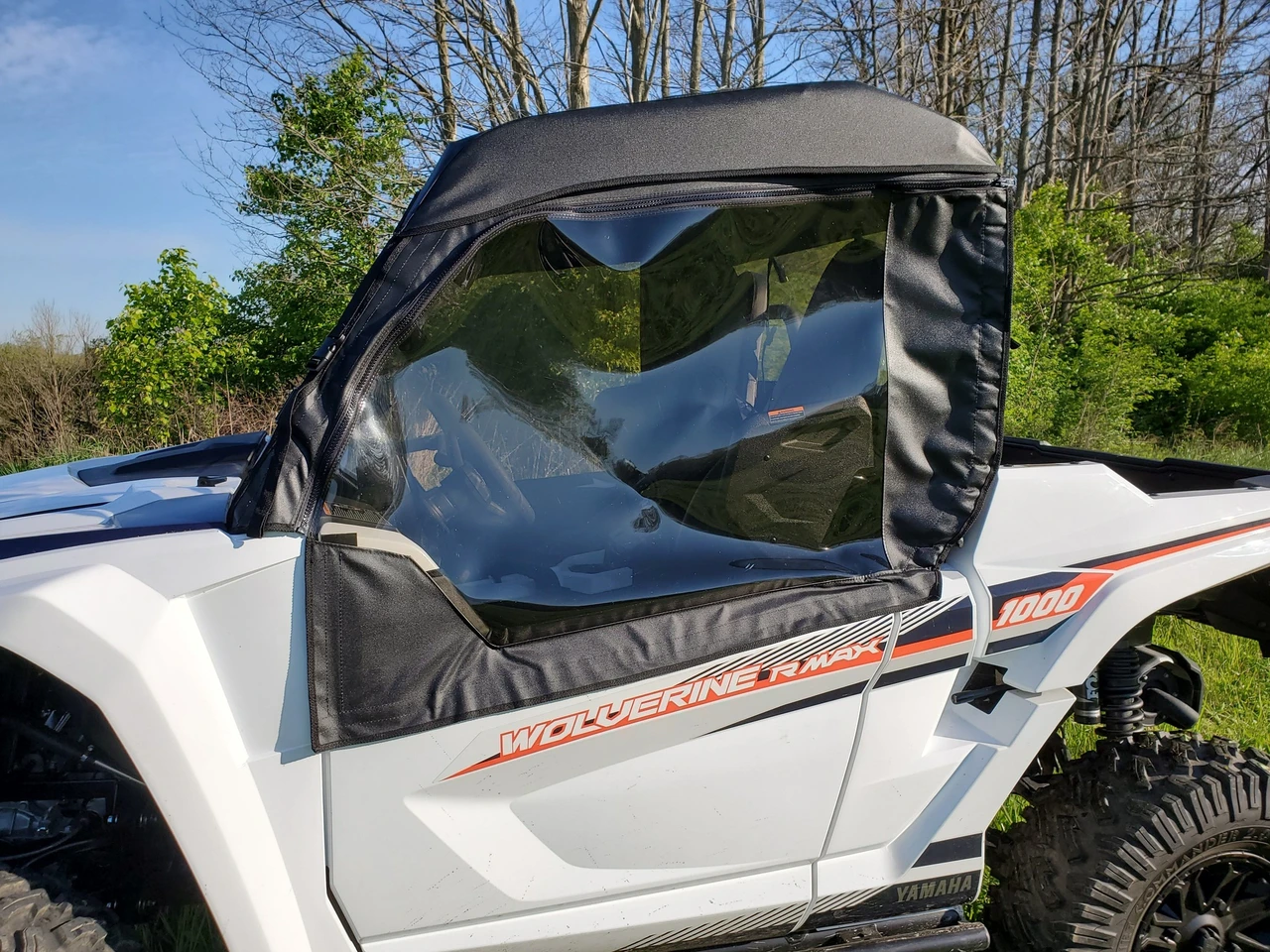 3 Star black soft door with clear window on a white Yamaha Wolverine RMAX2, close side view outdoors